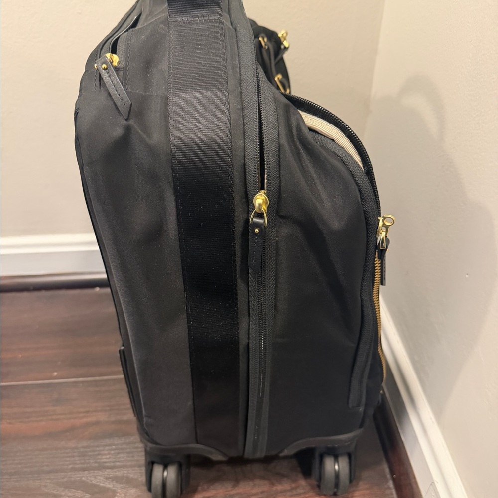 Tumi Black Rolling Travel Bag with Gold Hardware and Front Pocket - Picture 2 of 8